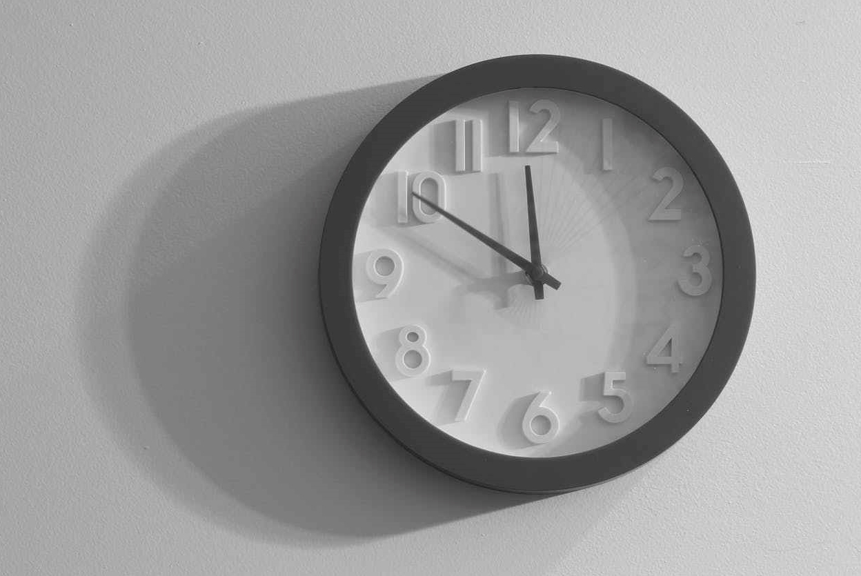 clock black and white wall